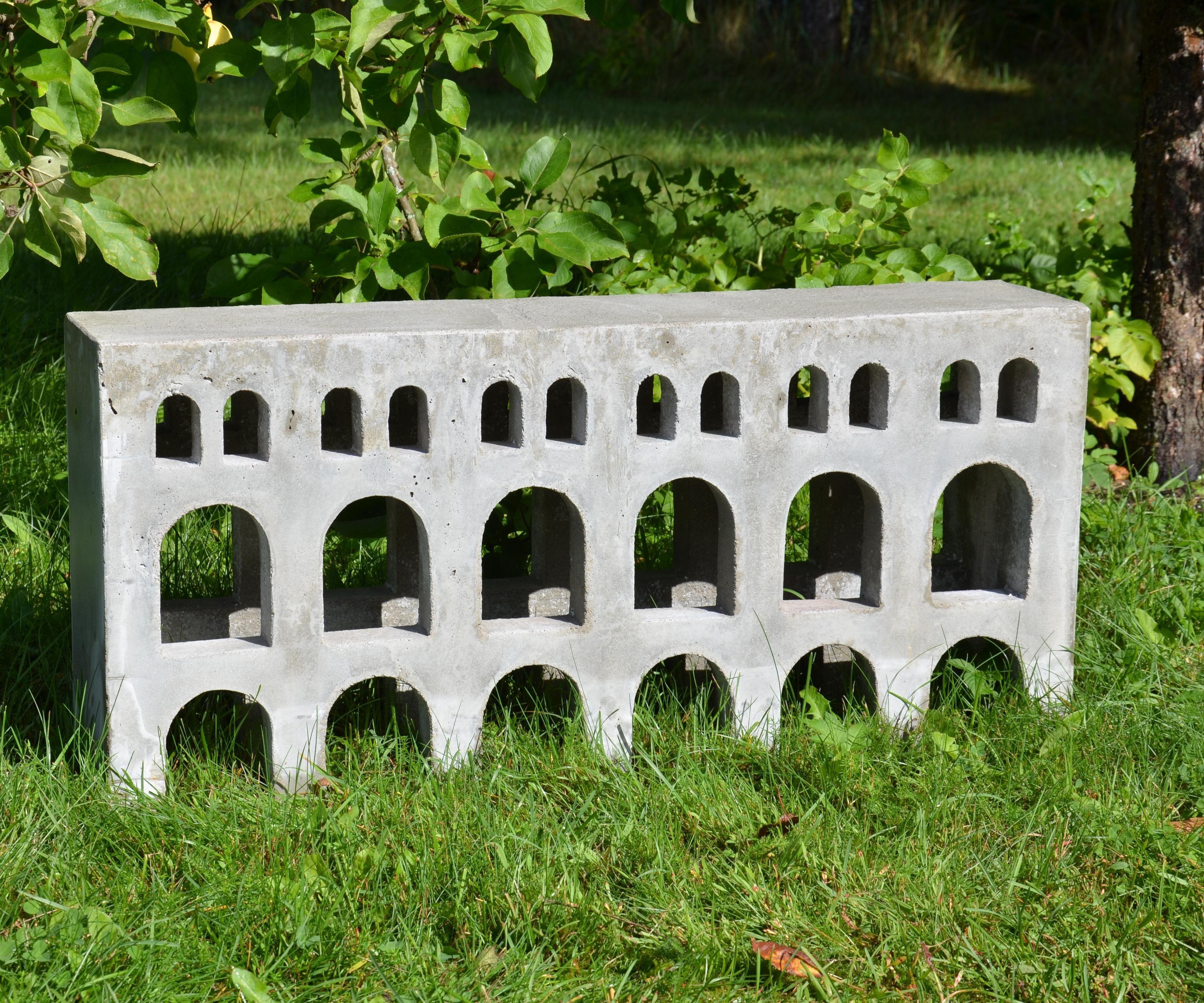 Concrete Bench Inspired by Roman Aqueducts
