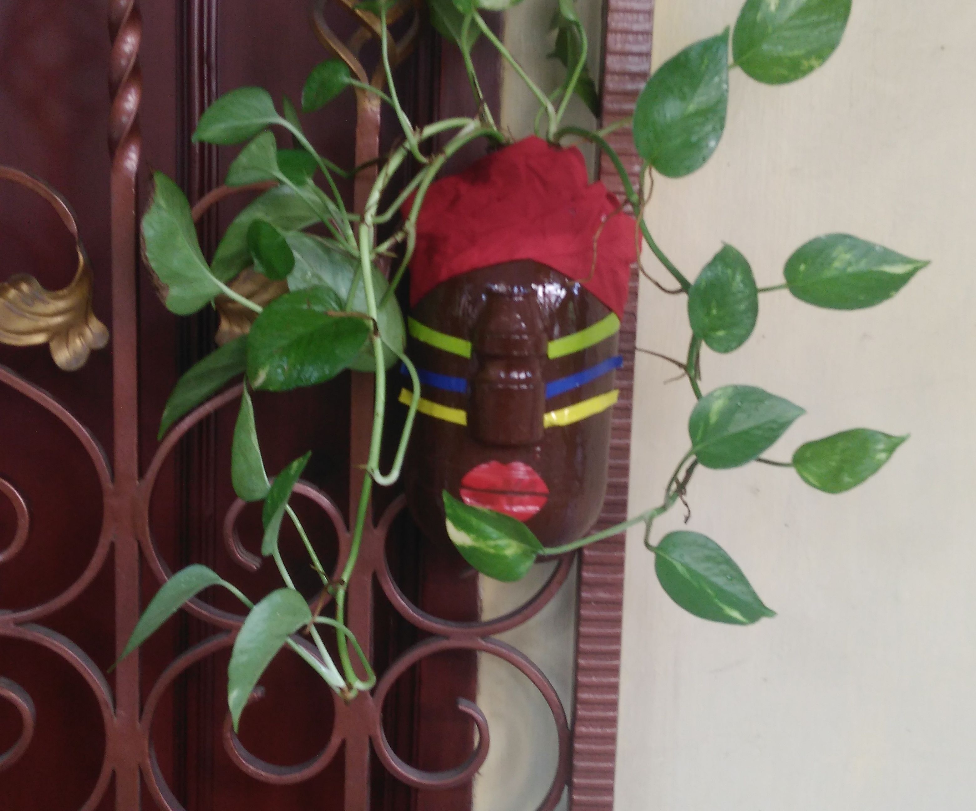 Upcycled Laundry Bottle to Hanging African Face Planter 