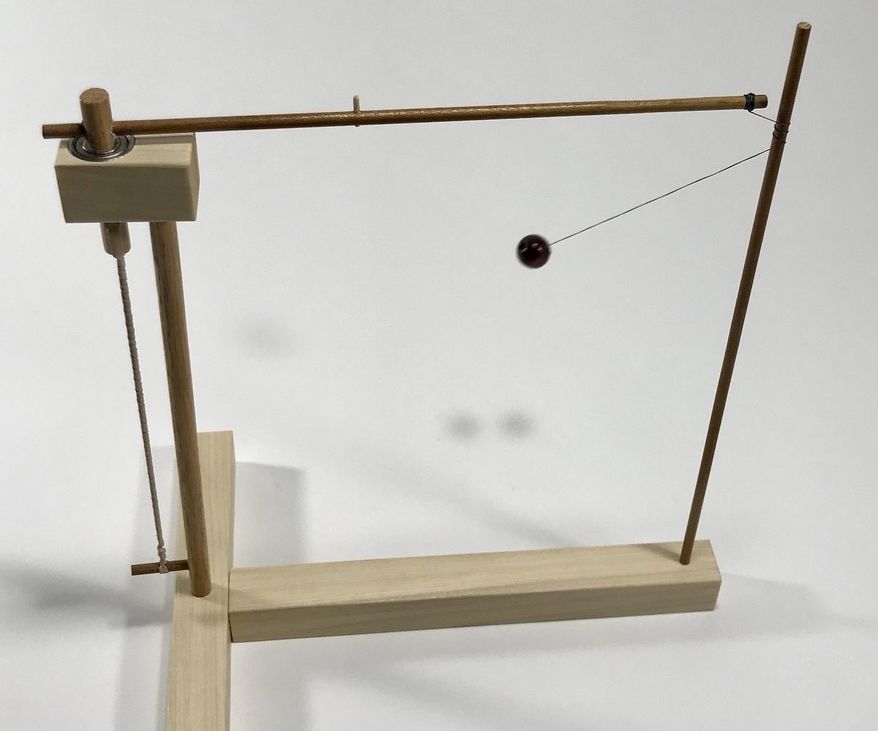 Mesmerizing Tether Escapement Toy