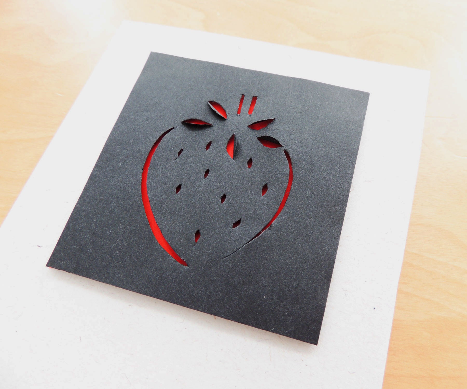 Eye-Catching Paper Cut Strawberry Design