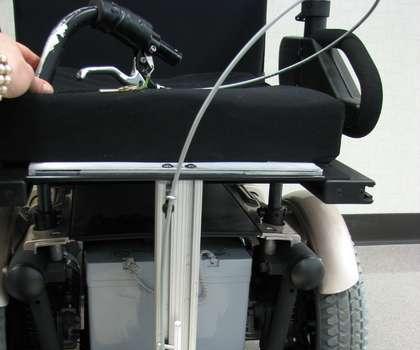 Completing Mock-Up of Spring-Loaded Design for Lift/Lower of Center-Mounted Footrests on Power Wheel Chairs