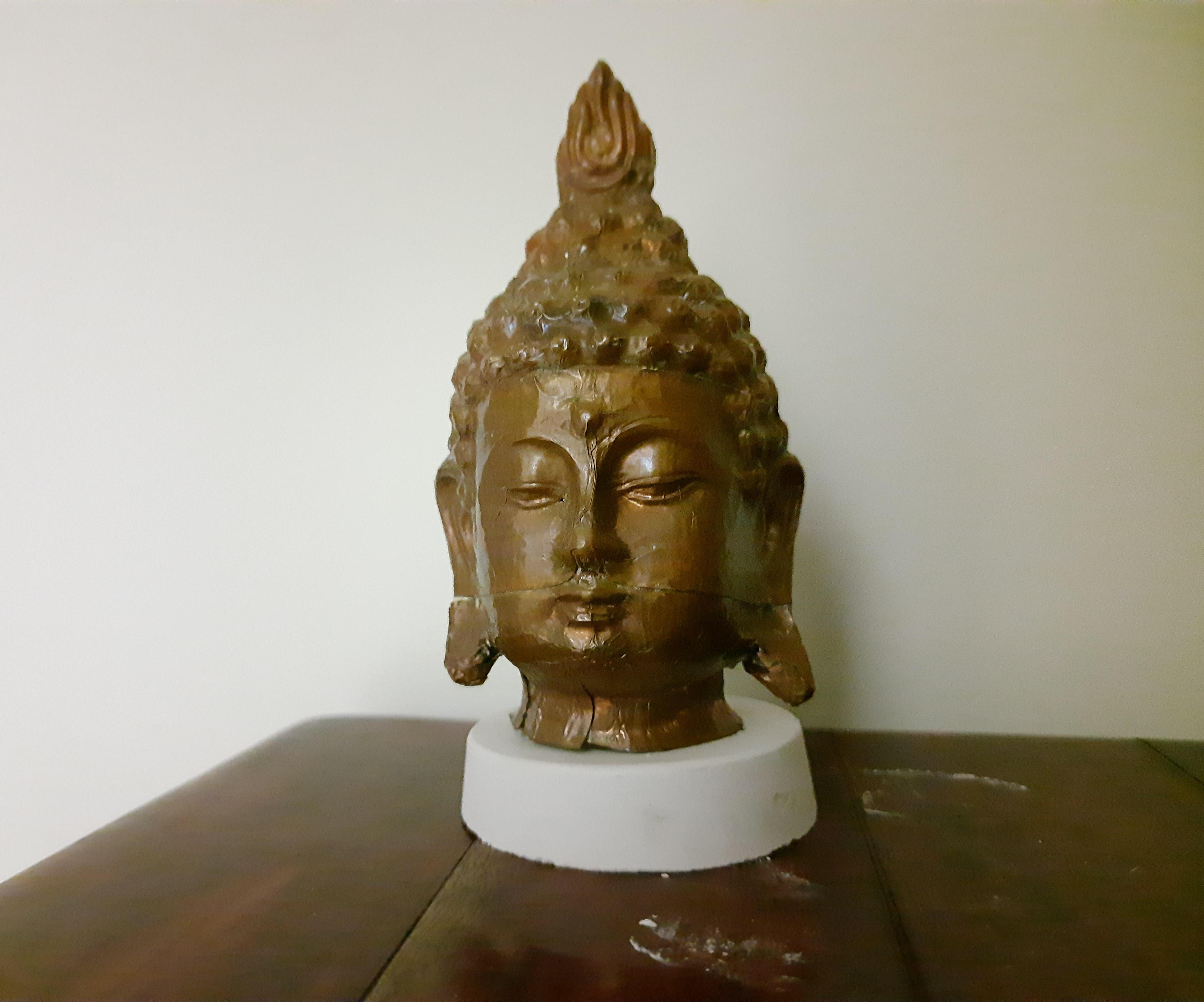 Sculpting an Antique Buddha