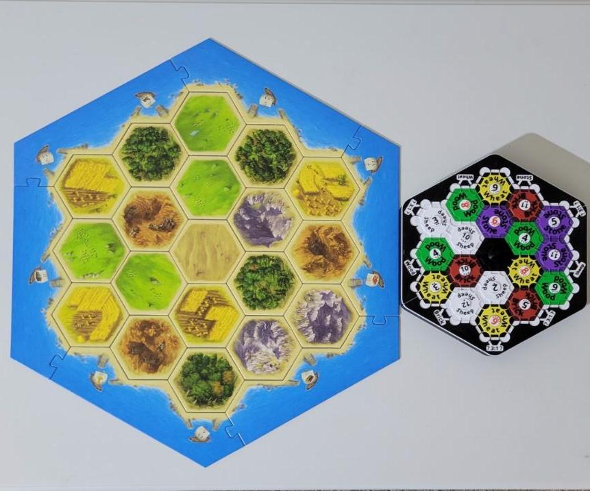 Mini Catan: a Compact and Portable Magnetic Board Game