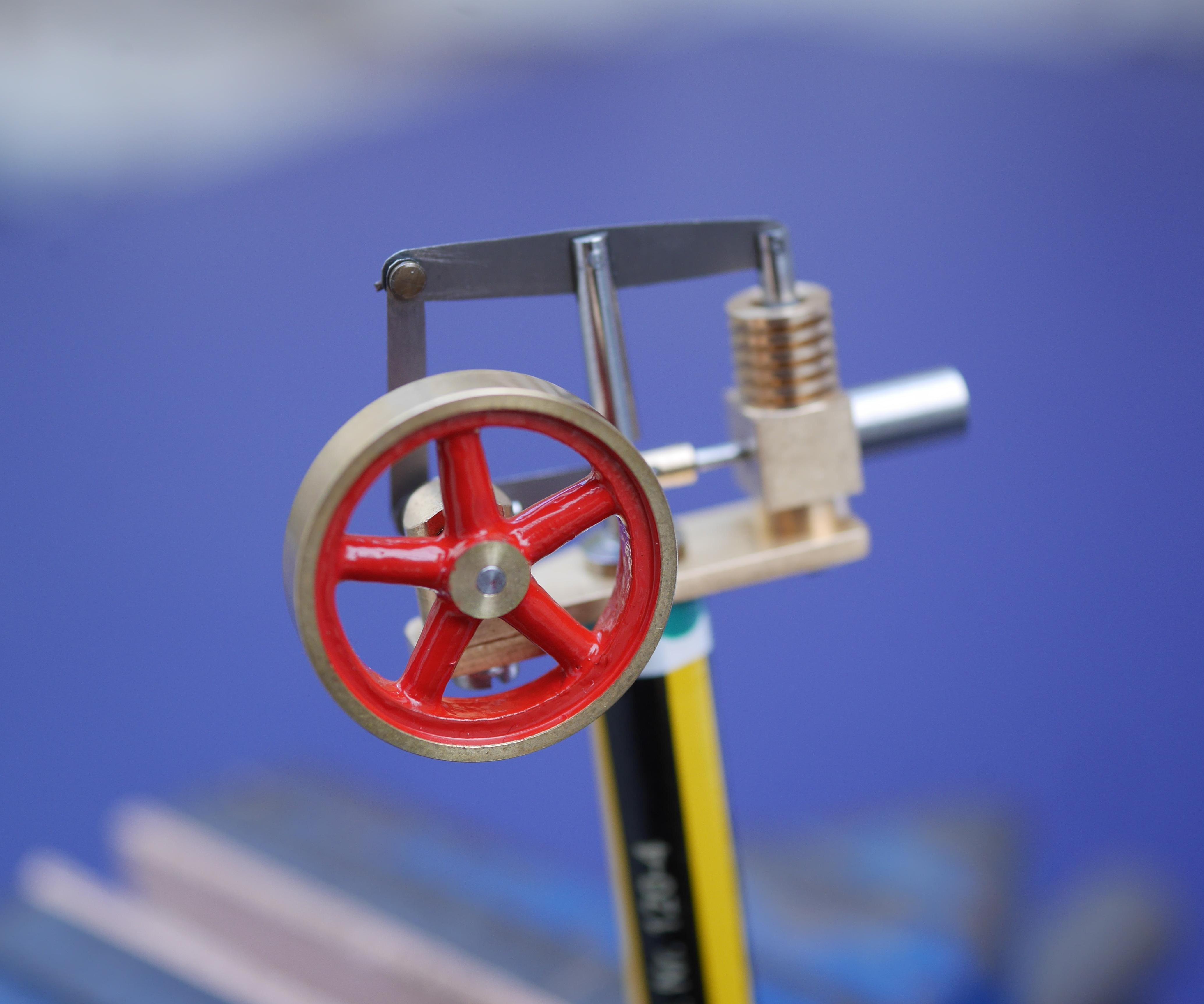 A Miniature Beam Stirling Engine