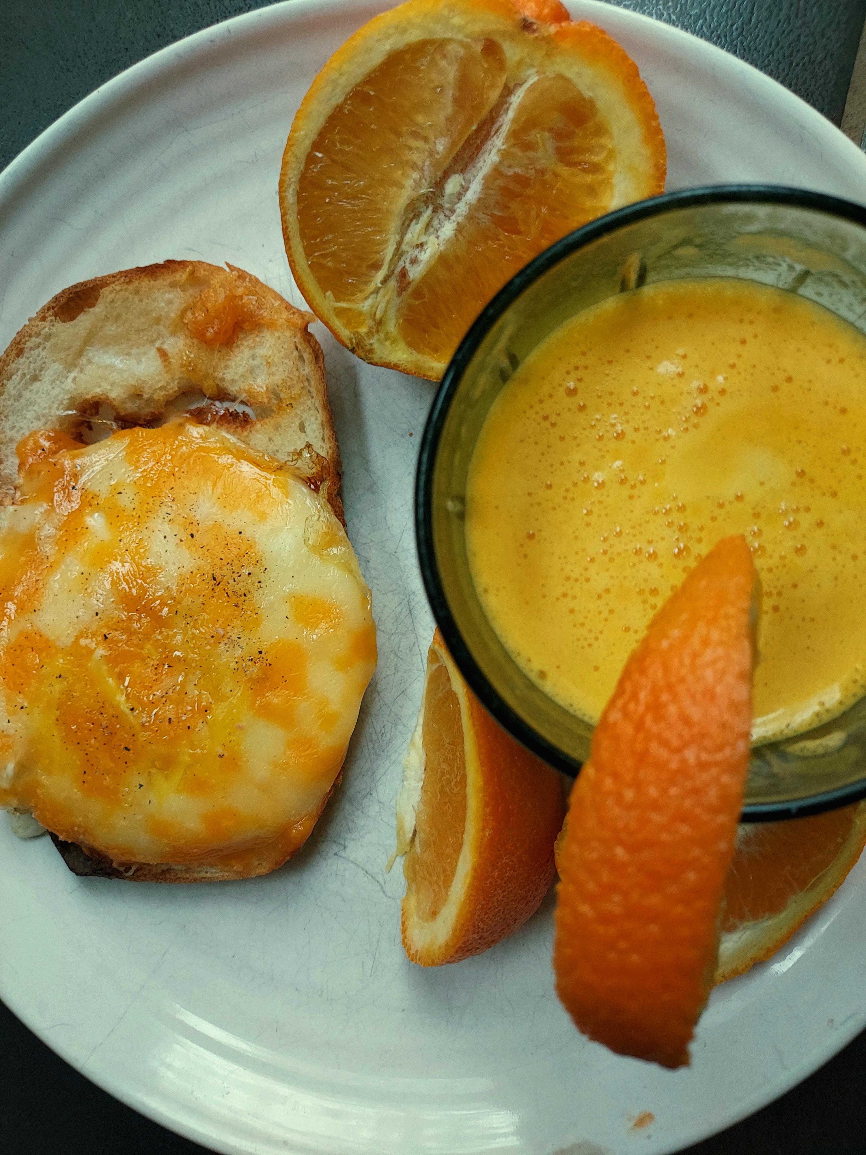 Over-Easy Egg Sandwich With Fresh Squeezed Orange Juice