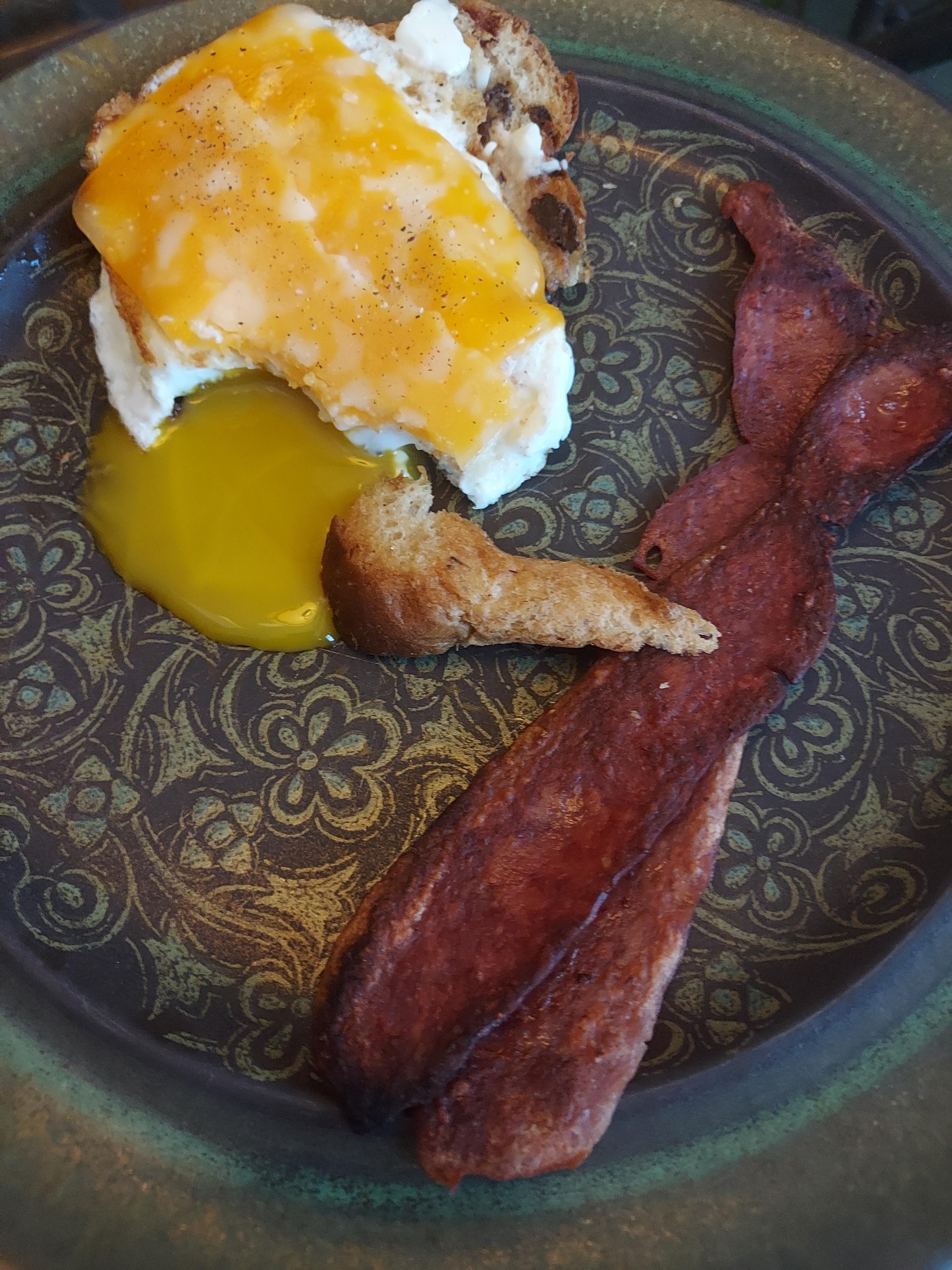 Delicious Sunny-Side-Up Egg Sandwich on Raisin Toast 