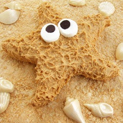 Sandy Cereal Treat Beach Topped With a Peanut Butter Starfish and Shimmering White Chocolate Shells.