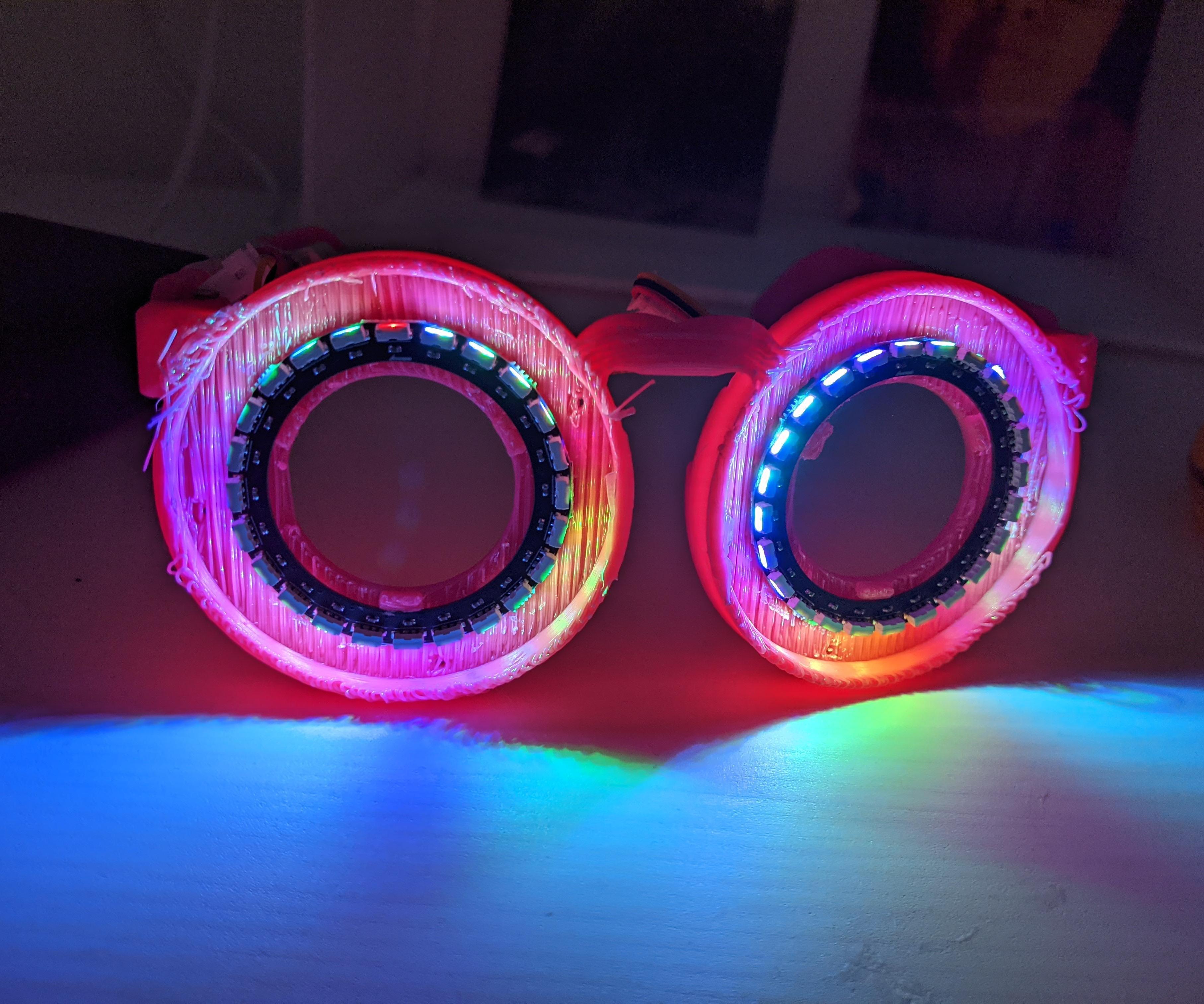 A Pair of LED Glasses With Outwards Facing LED Ring