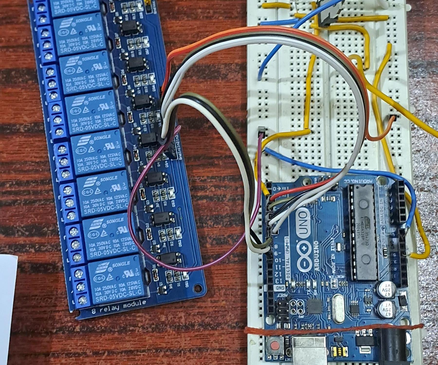 Controlling Arduino Uno and 8 Channel Relay Board Using TV Remote and IR Receiver