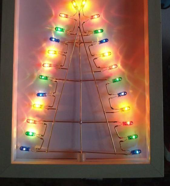 A Luminous Christmas Tree in a Picture Frame, Made From Old Light Strip Bulbs