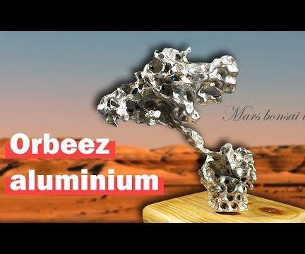Futuristic Martian Tree Sculpture Made With Aluminium Poured in to Orbeez