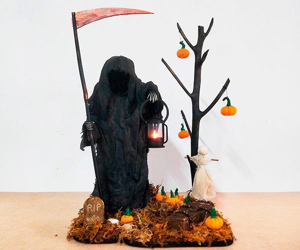 Grim Reaper With Scythe & Lantern in Graveyard Halloween Decor