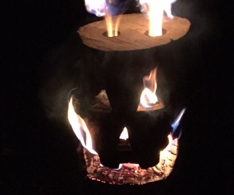 Log Rocket Stove Jack-O-Lantern