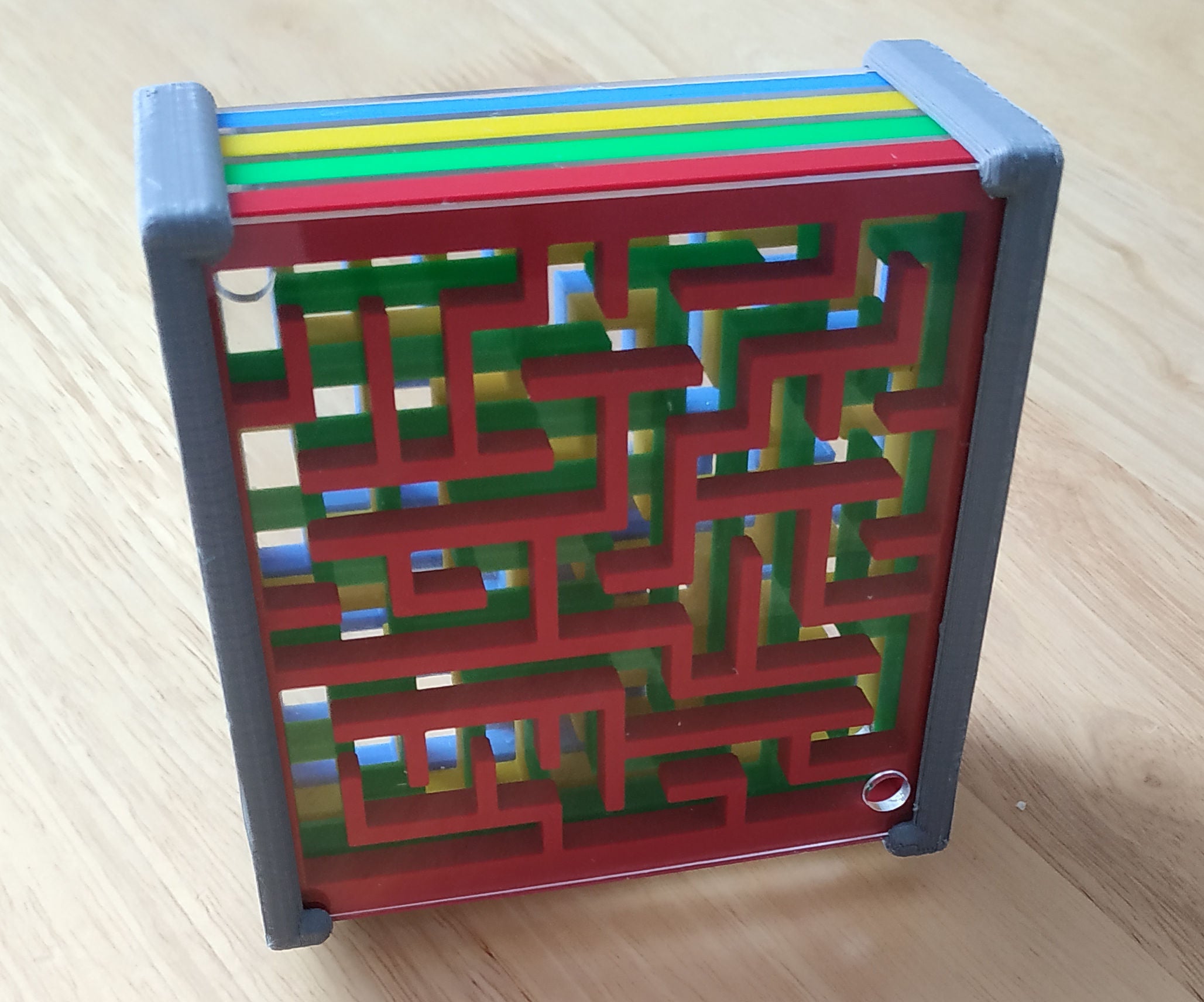 Stacked Ball-in-the-Maze Puzzles