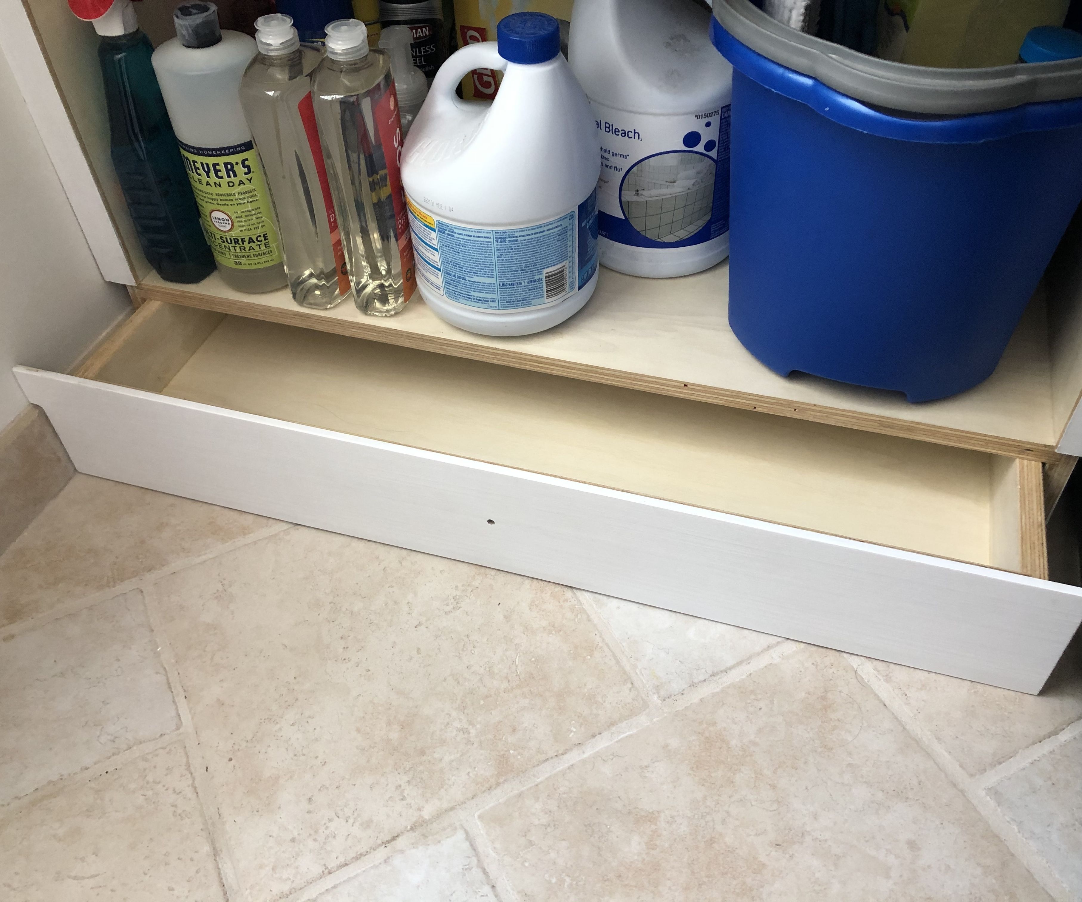 Shelving With Concealed Toe-Kick Compartment