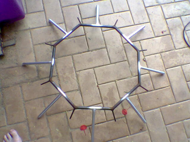 04-centre of roof , 8 large silvered spiked are used first.jpg