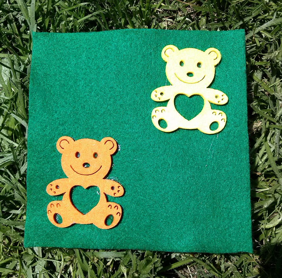 10 Stick Two Teddy Bears Onto Green Foam.jpg