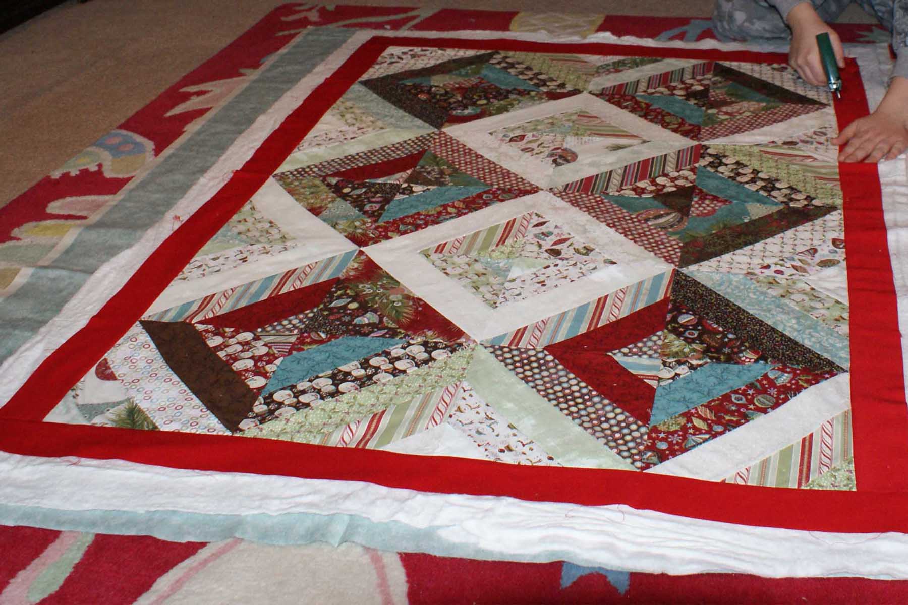 10 basting quilt with tag tool use web.jpg