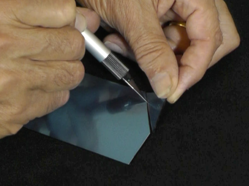 10 cutting blue film last cut.cr.png