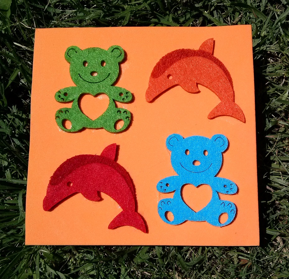 11 Stick Two Dolphins Onto Orange Foam.jpg