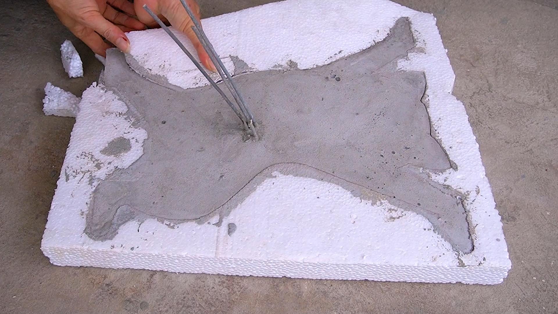 14. Amazing concrete cat shaped coffee table.00_01_49_05.Still010.jpg