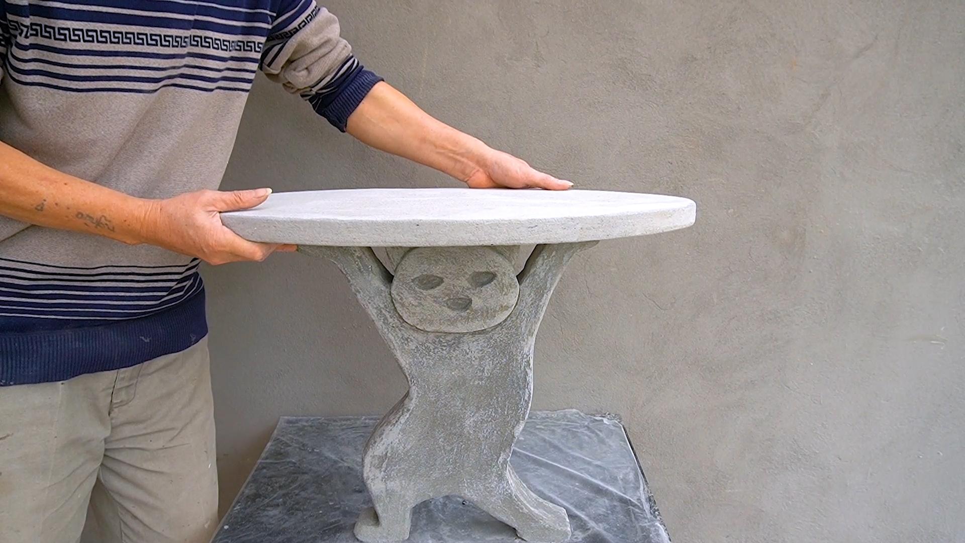 14. Amazing concrete cat shaped coffee table.00_03_41_17.Still022.jpg