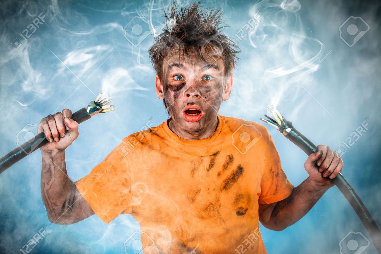 14569672-Boy-has-a-electric-shock-Stock-Photo-crazy.jpg