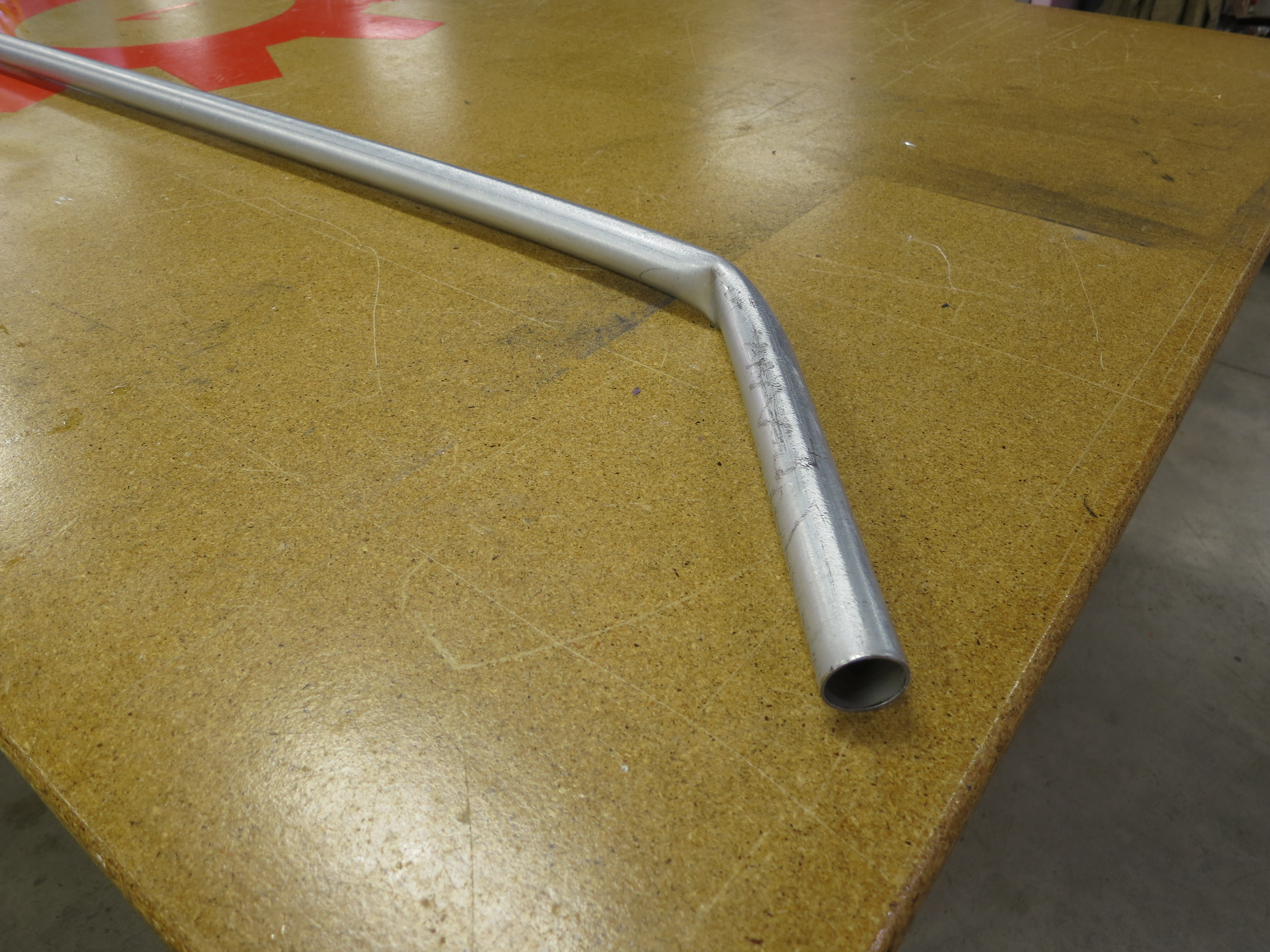 18 _ My first attempt at bending Conduit without the right Bender kinked the tube..JPG