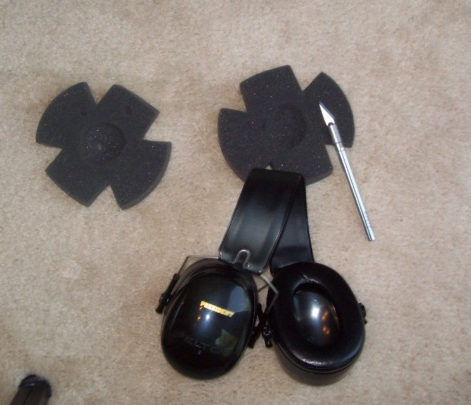 2 - Removed foam inserts, Exacto-Knifing a pocket in the foam for the earphones (1024x768).jpg