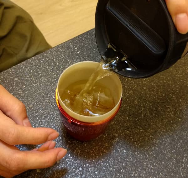 2-pour oolong into cocktail shaker.jpg