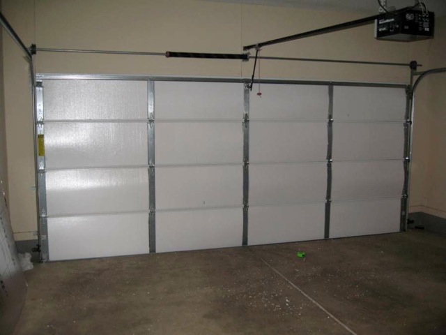 2010 Installation of radiant barrier on garage door013.jpg