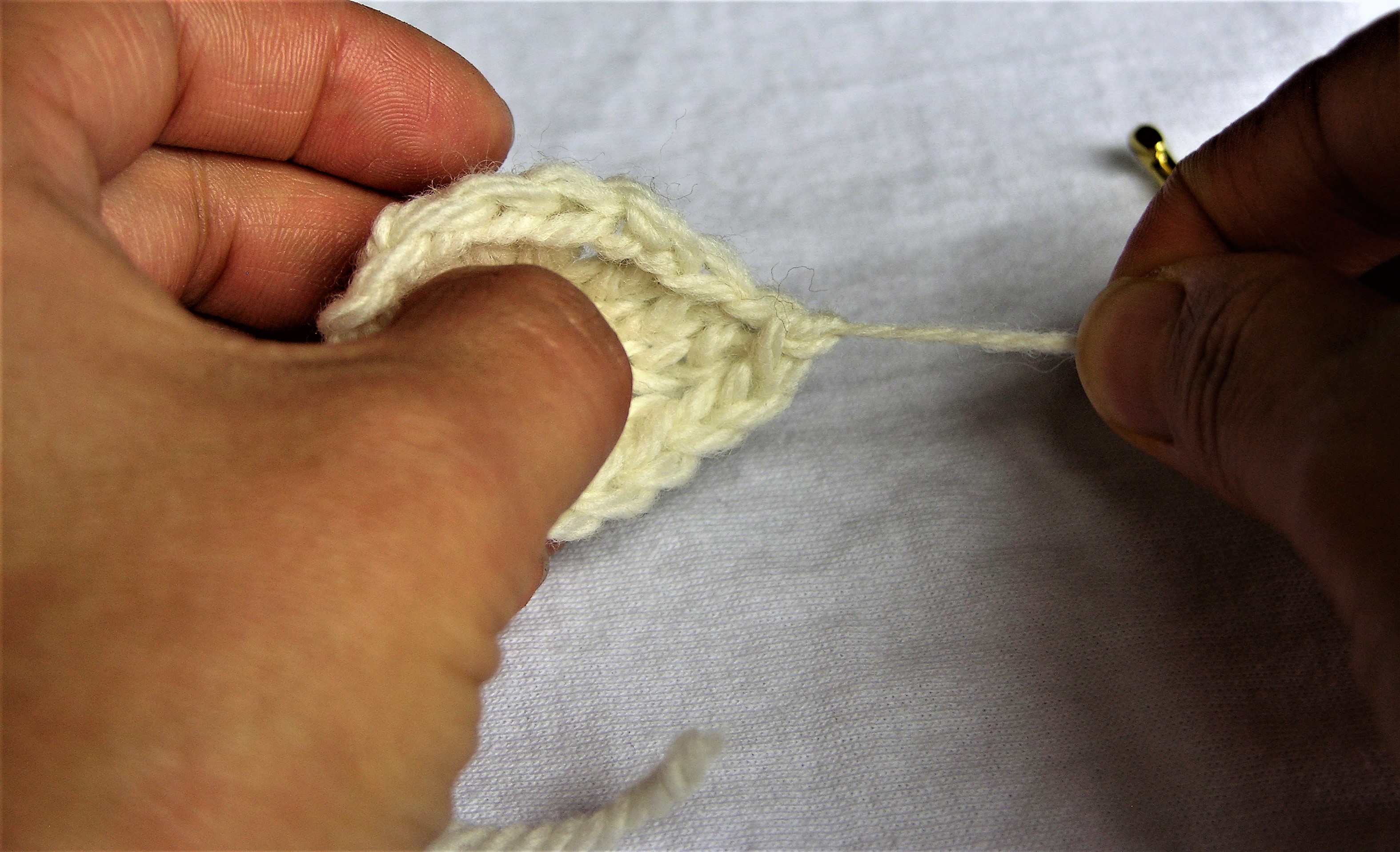 29 finish off pull yarn tail snug.JPG