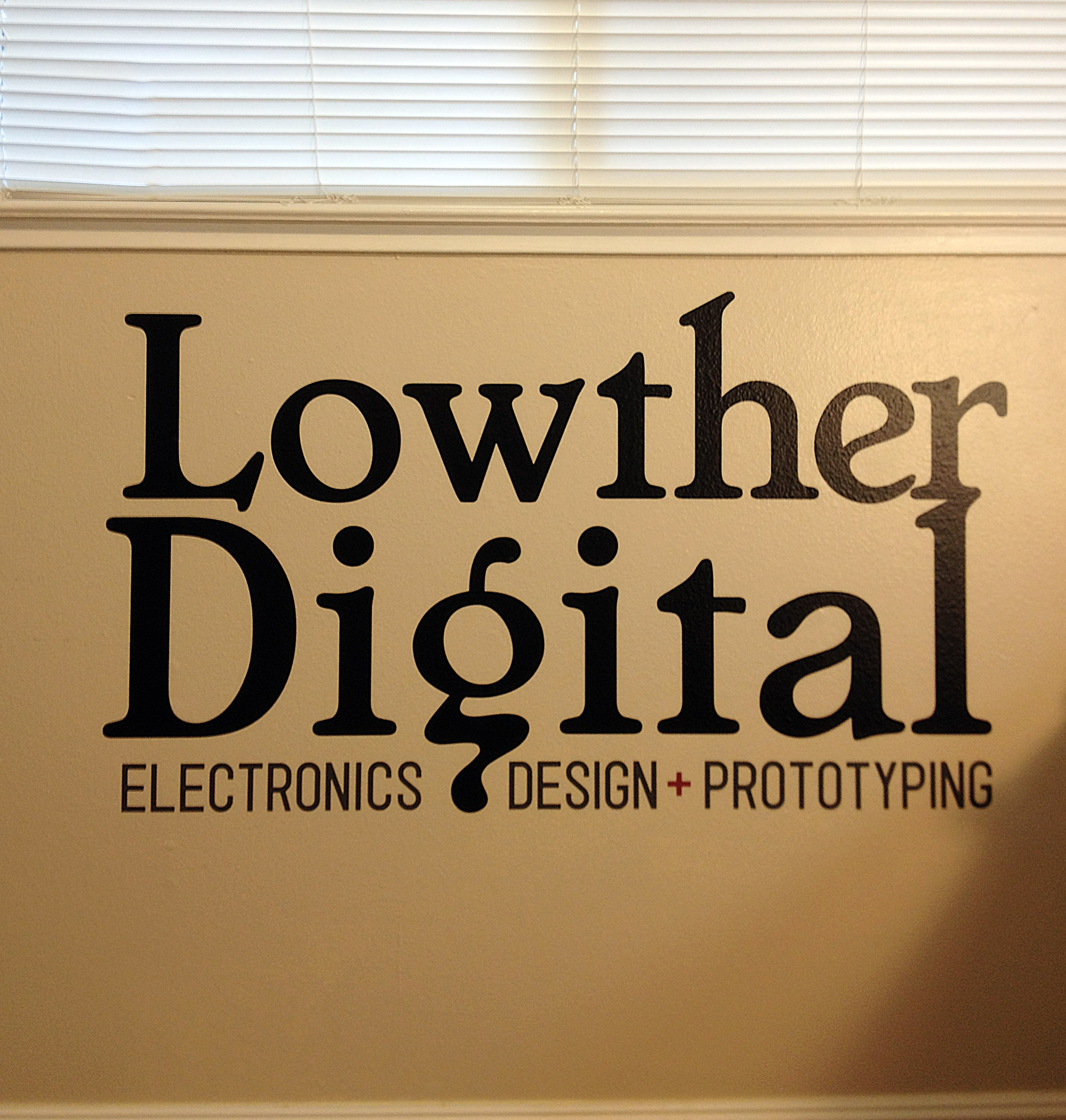 2D Logo on Office Wall - Vinyl Lettering - from Ai Logo Design.jpg