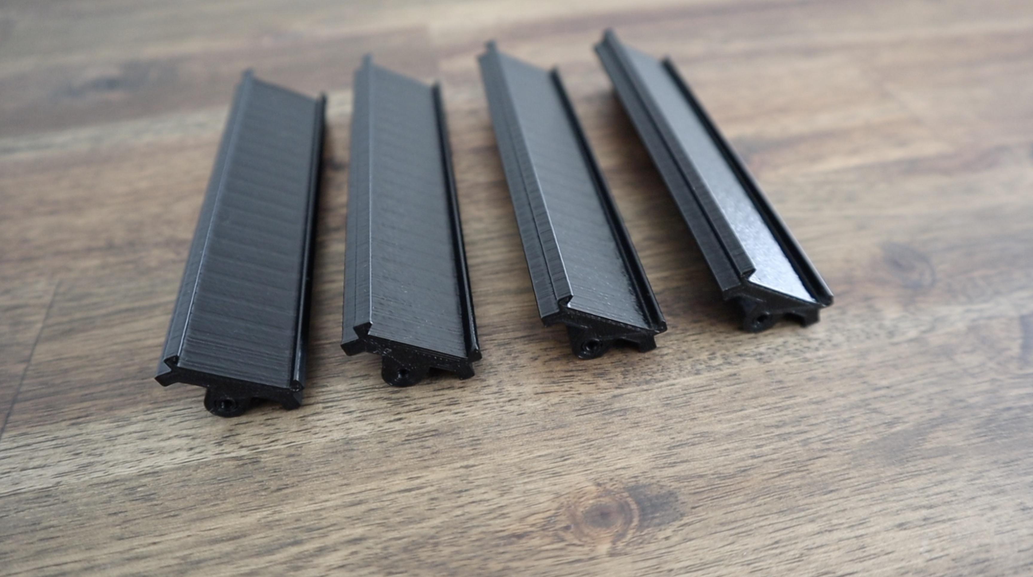 3D Printed Corner Pieces In Black PLA.jpeg