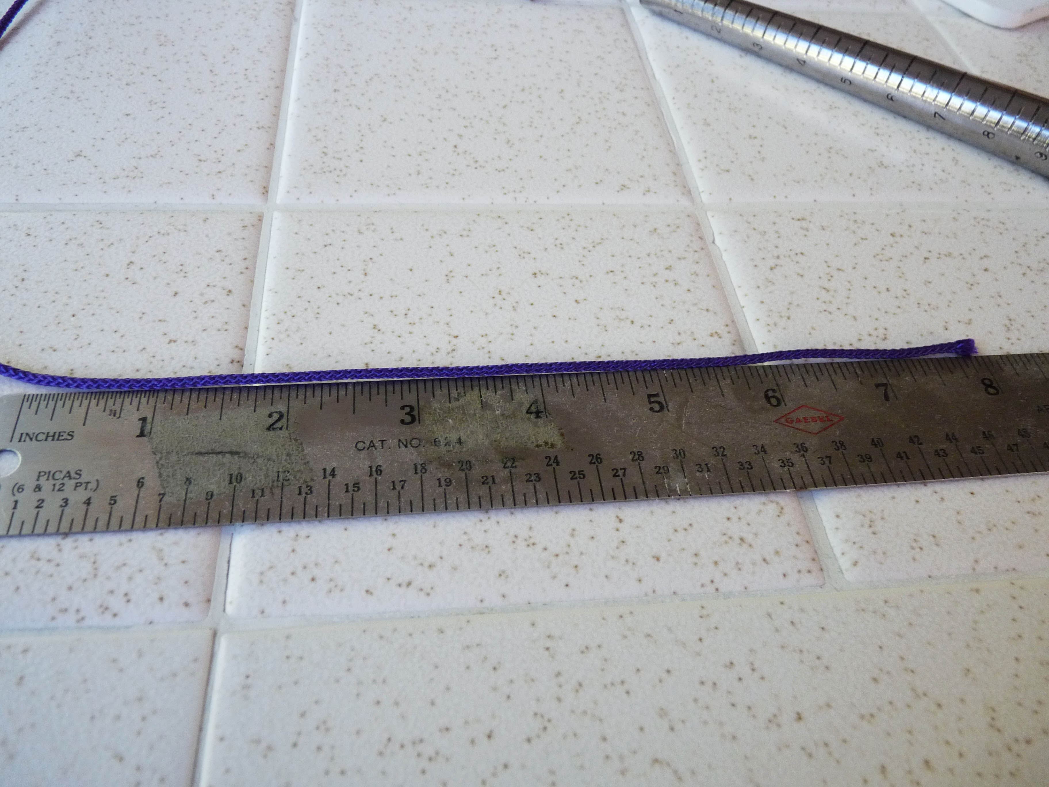 4 cord on ruler.jpg