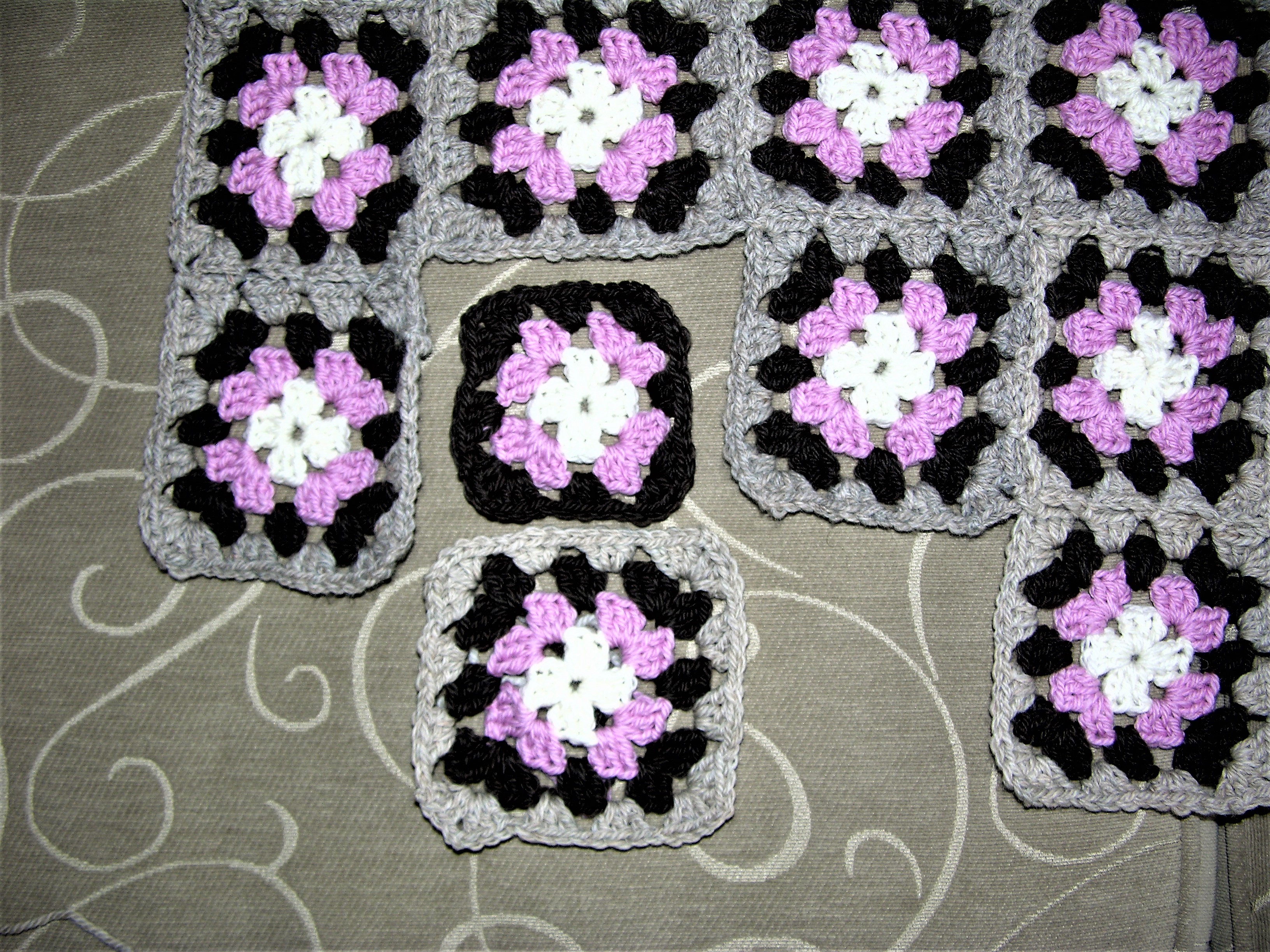 48 crochet squares together 1 of 3rnd square and 4 of 4 rnds square.JPG