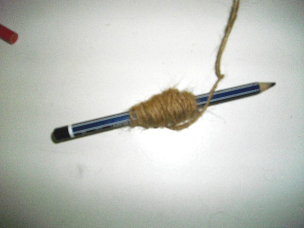 6.2 - Wind string around the pencil.JPG