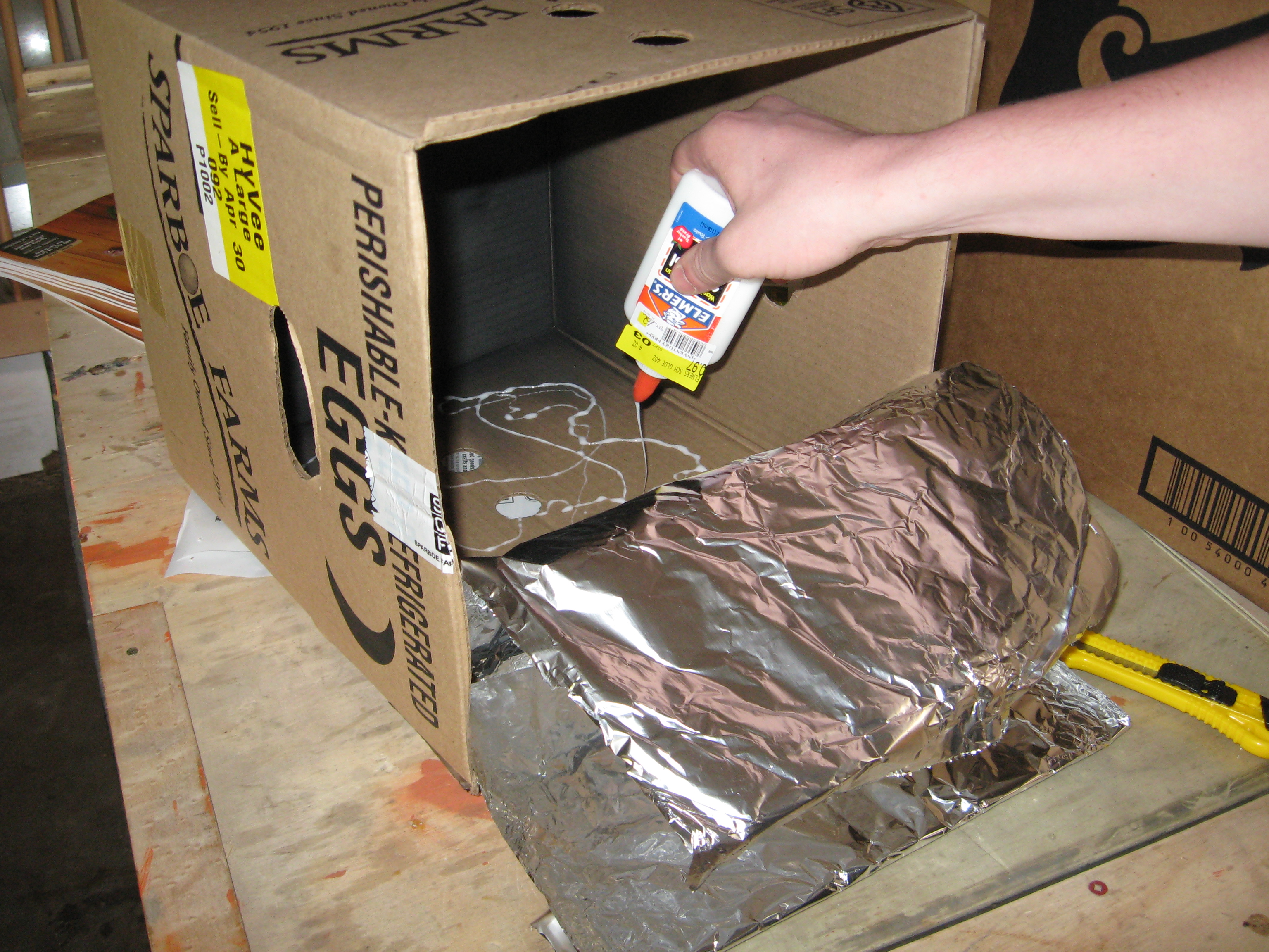 7glueing aluminum foil on inside of small box.JPG