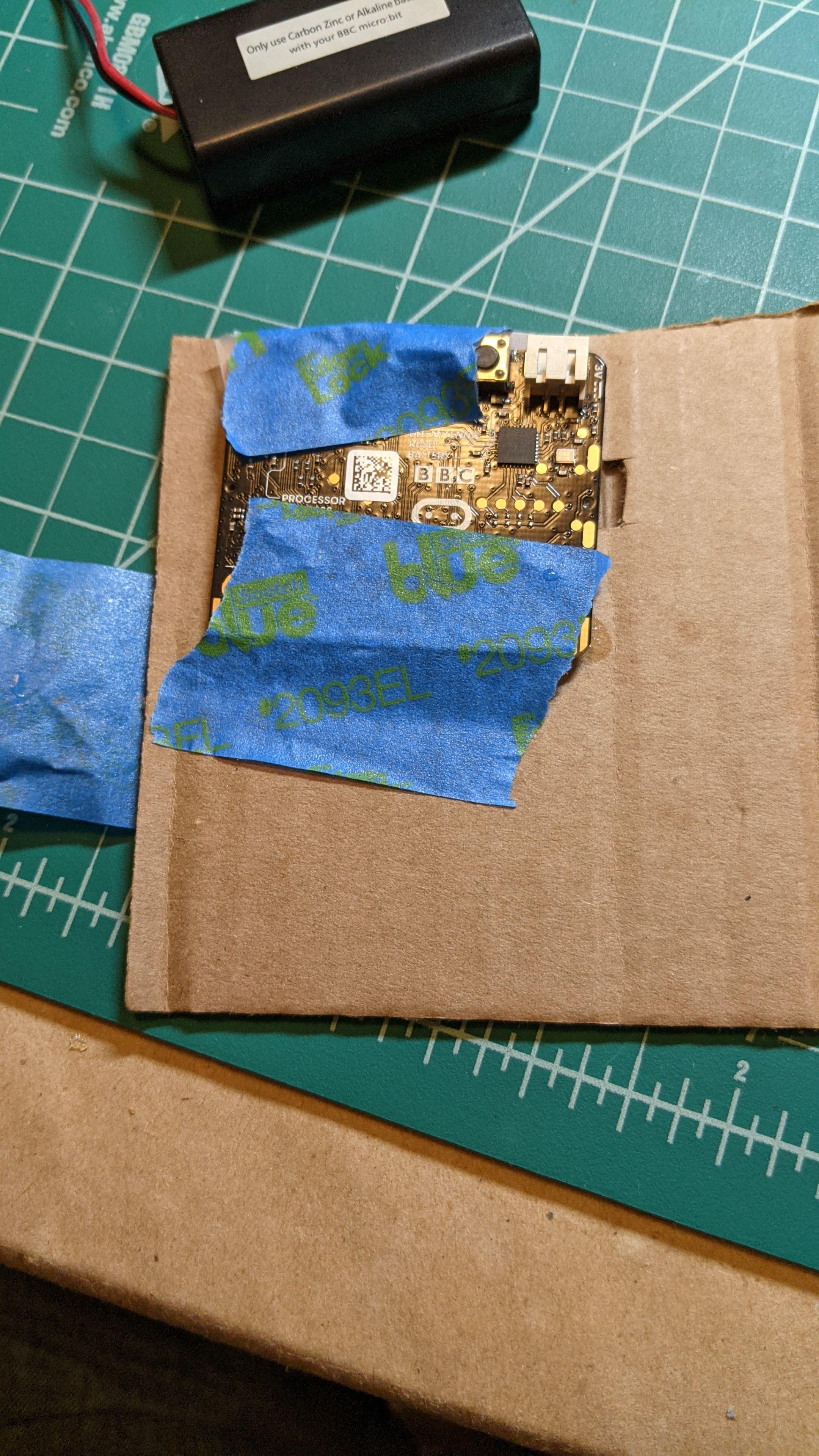 8 Tape Microbit to cardboard.jpg