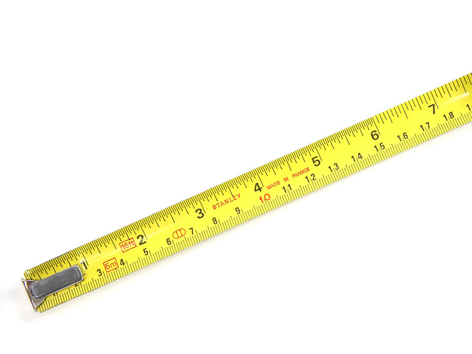 9176-a-measuring-tape-isolated-on-a-white-background-pv.jpg