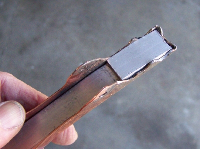 Aluminum bent and laid in handle.jpg
