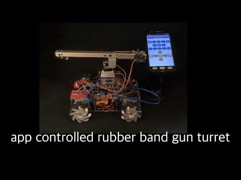 App controlled rubber band gun on top of a mecanum car