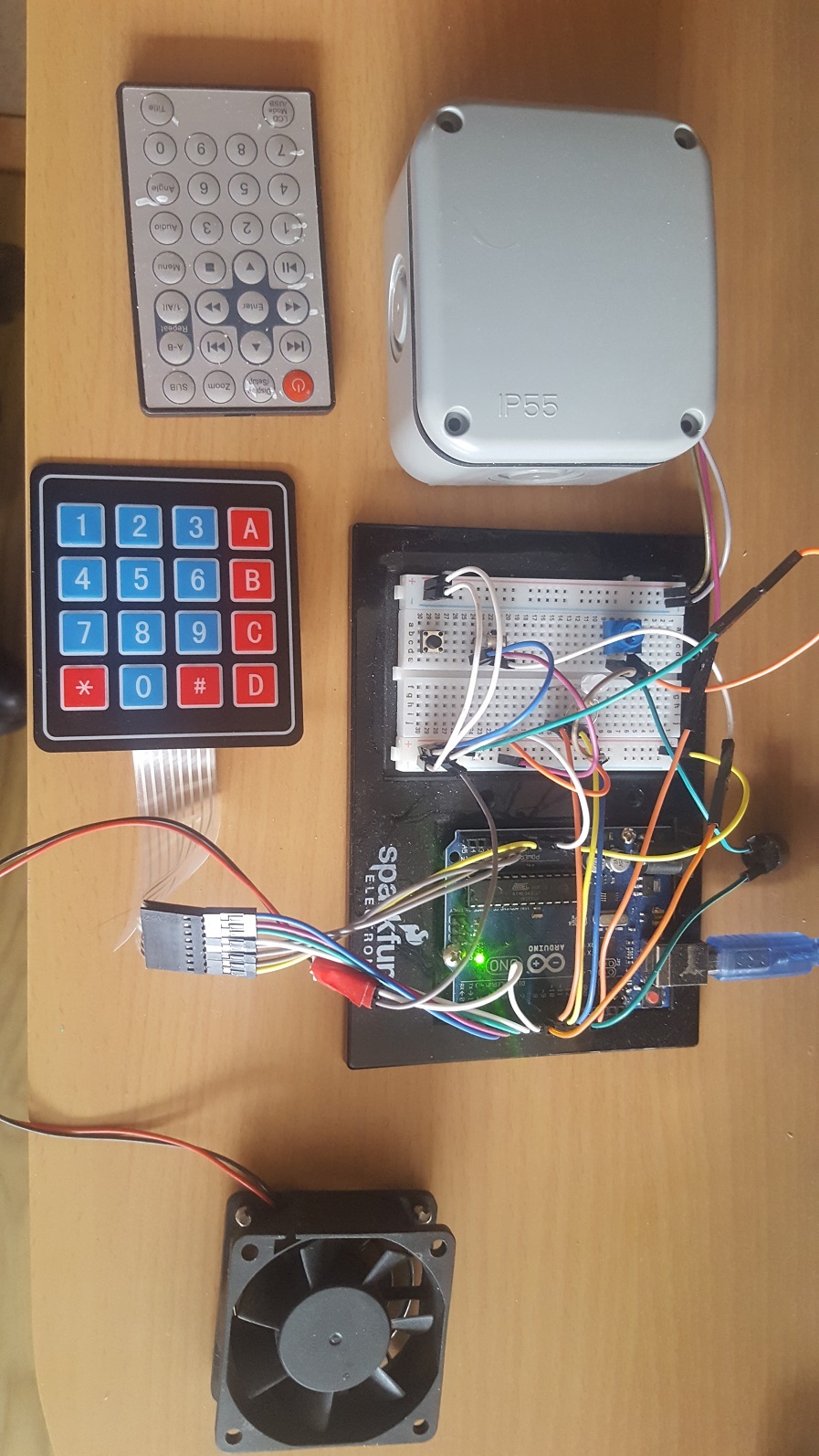 Arduino Infrared Alarm System with remote button 1 and 2 simulating home automation.jpg