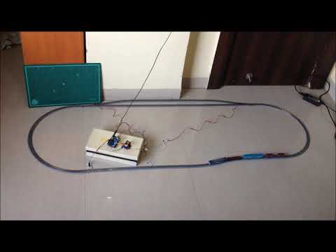 Arduino controlled model train layout with automated passing siding