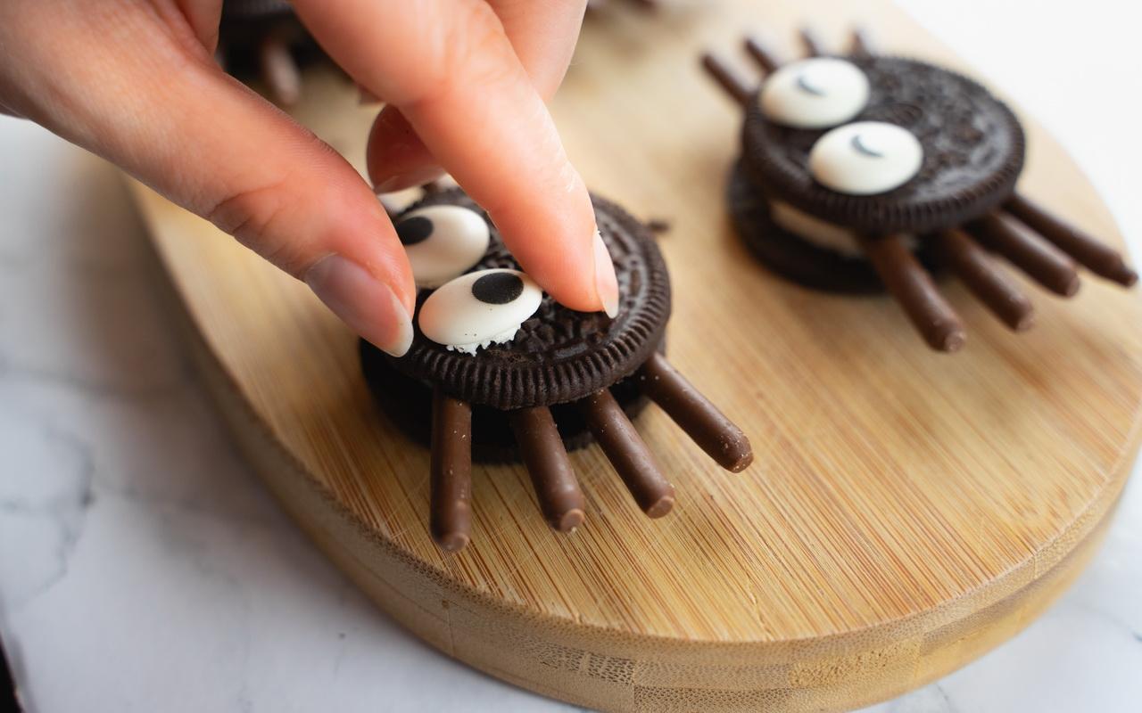 Bat &amp; Spider Halloween Cupcakes - Securing Googly Candy Eyes.jpg