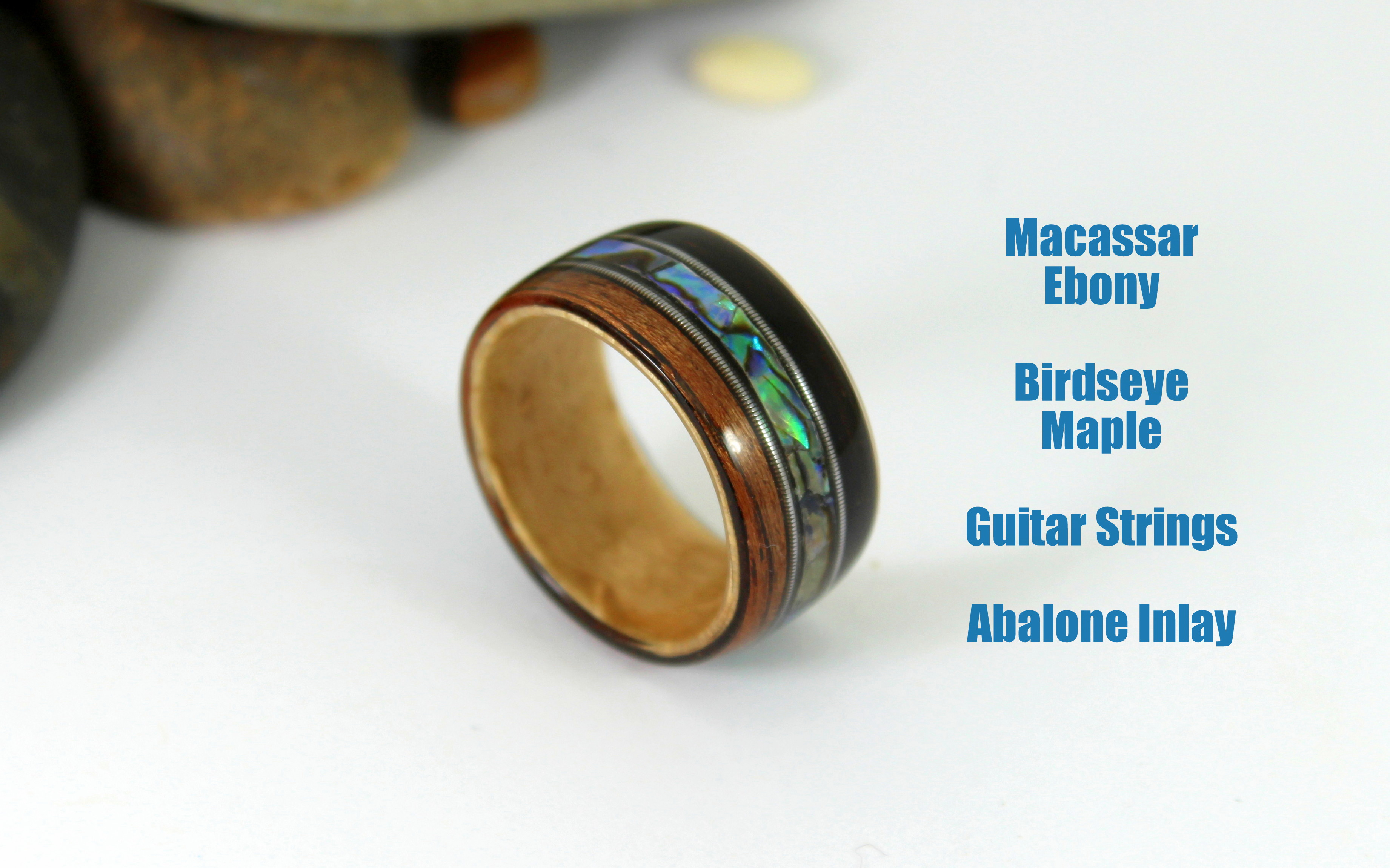 Bent Wood Ring With Guitar Strings and Abalone Inlay.JPG