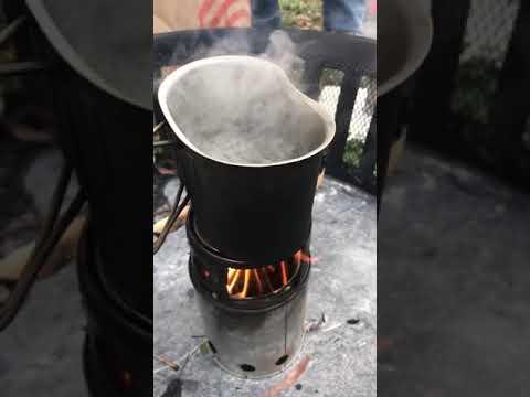 Boiling water on a wood gas stove