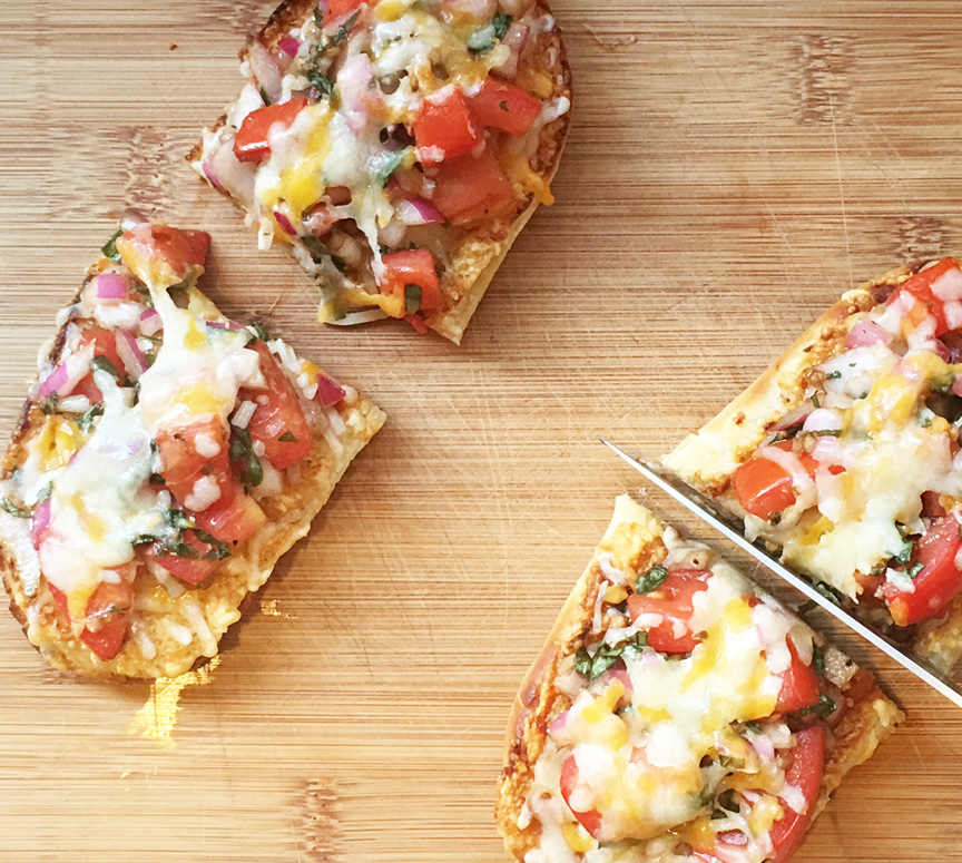 Bomba Barbarian Bruschetta Pizza slice.jpg