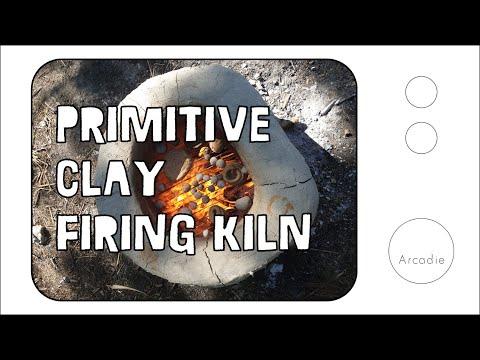 Building a primitive Clay firing kiln by the lake