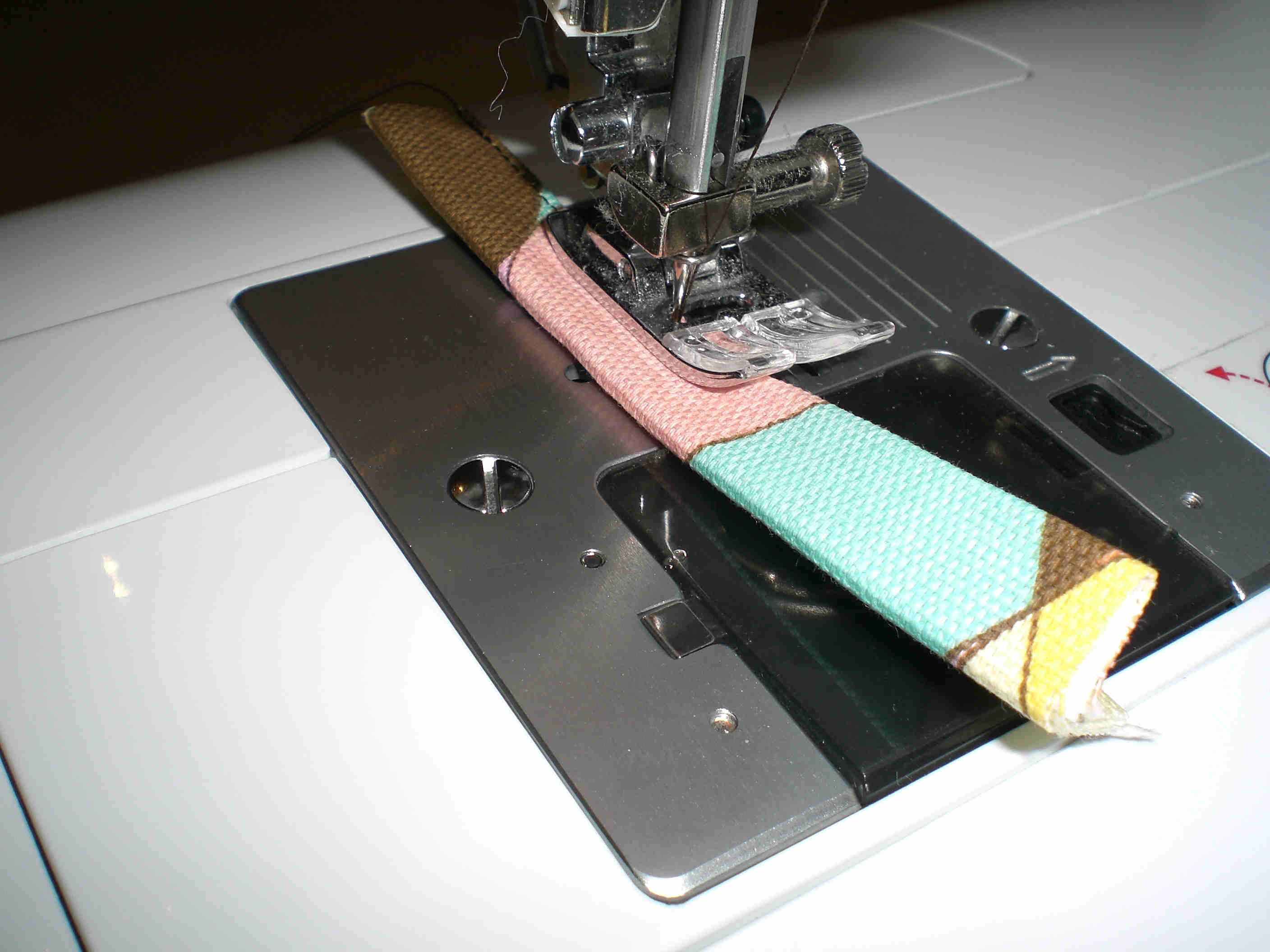 C:\Users\Lisa Varco\ETSY\Contest\key ring strap being stitched.jpg